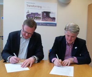 L - R County Cllr Mark Hawthorne and City Cllr Paul James Sign Memorandum of Understanding